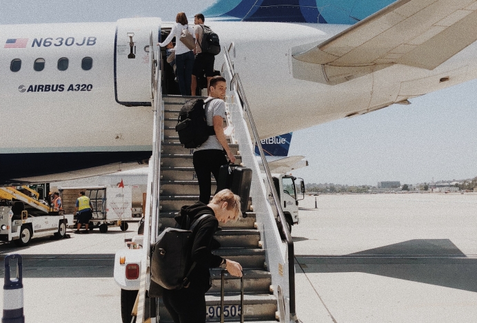 People boarding a plane