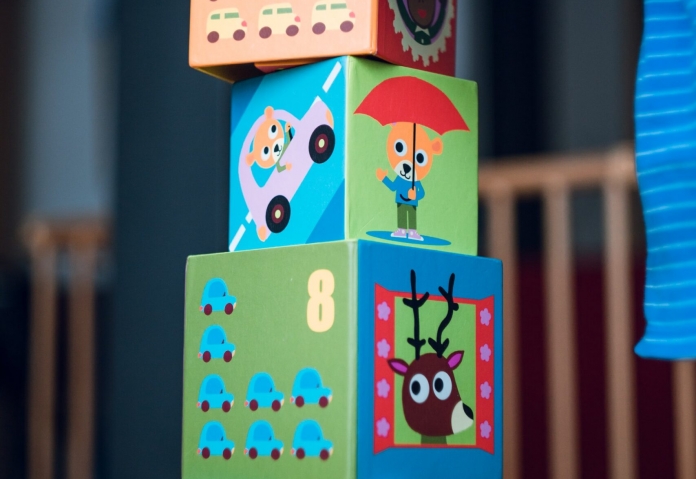 child playing with building blocks